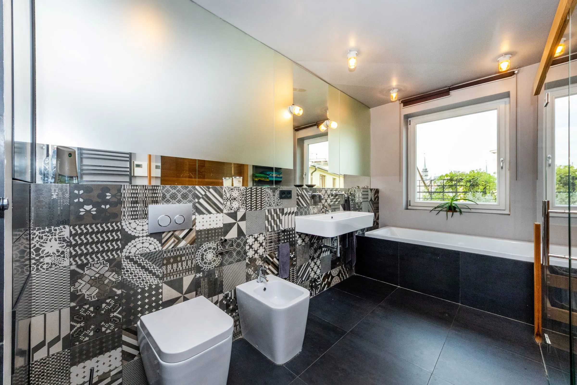 Modern bathroom with a tub downstairs